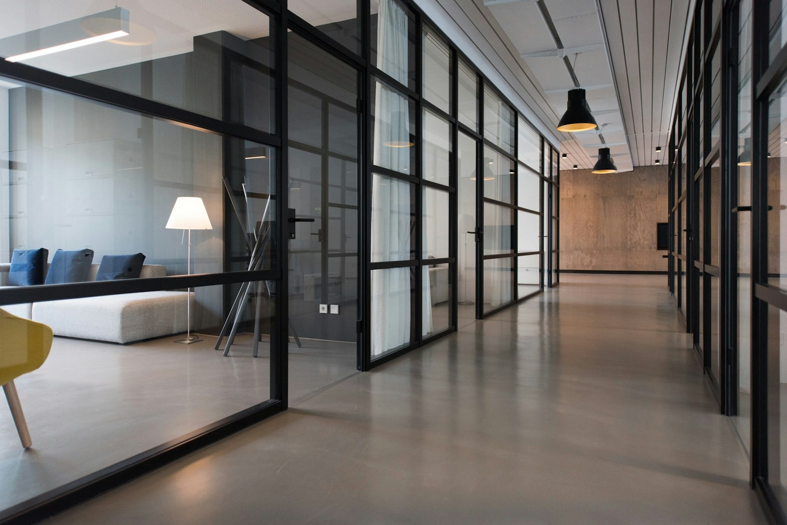 Glass-fronted office corridor